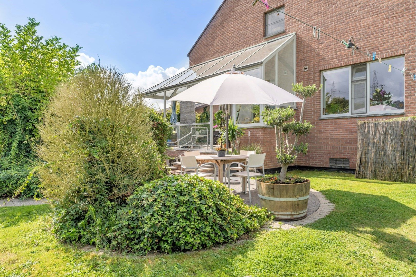 Knap ingerichte villa op heden bestemd als meergezinswoning met prachtige tuin op 20a 21ca, vlakbij het centrum van Bilzen foto 26