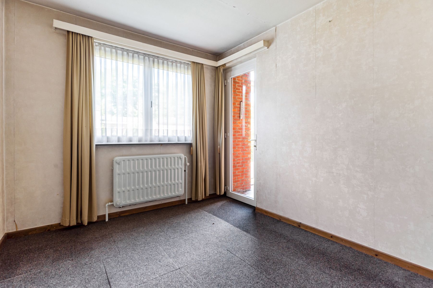Unieke kans: appartement met tuin, garagebox en berging foto 10