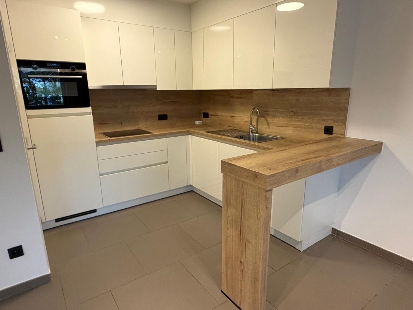 Duplexappartement met 2 slaapkamers, terras en autostaanplaats foto 3