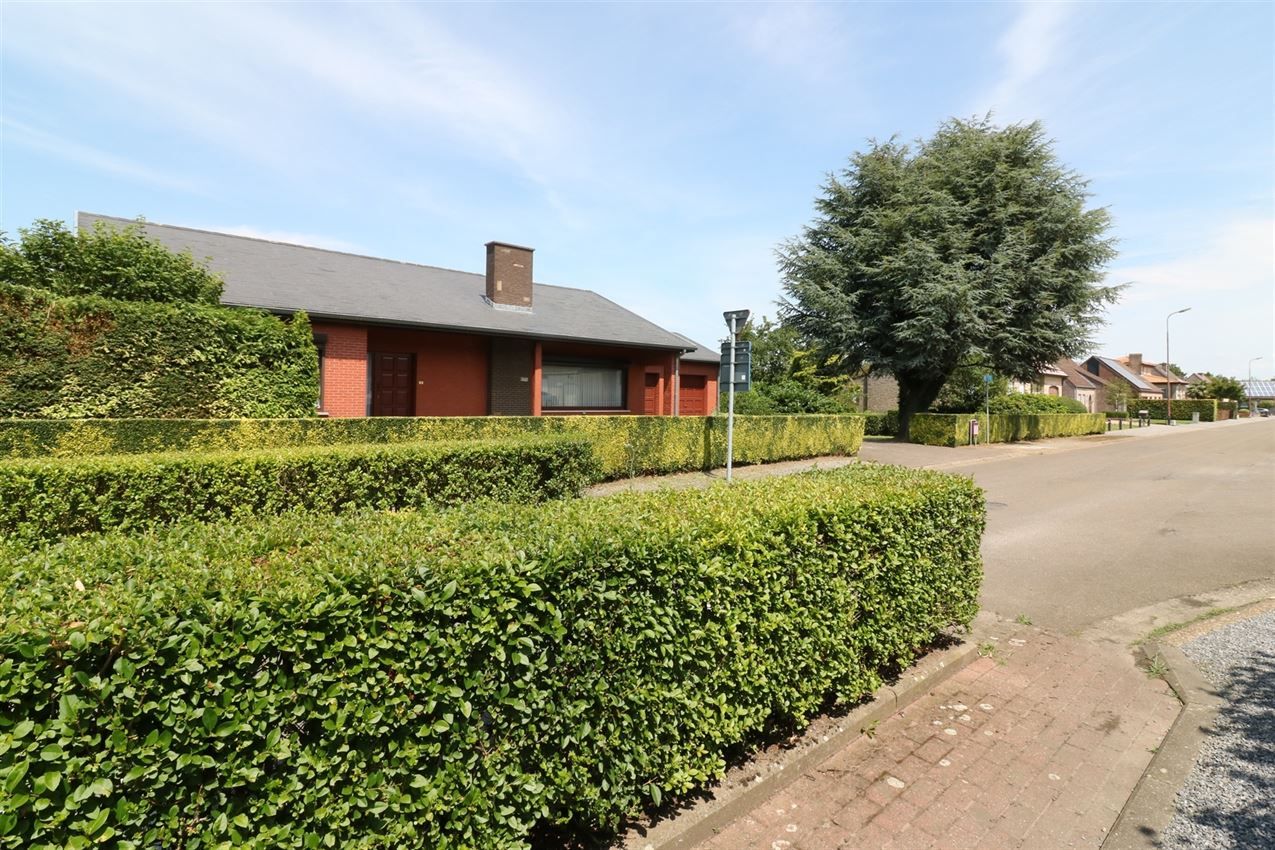 Degelijk onderhouden woning grenzend aan agrarisch gebied foto 33