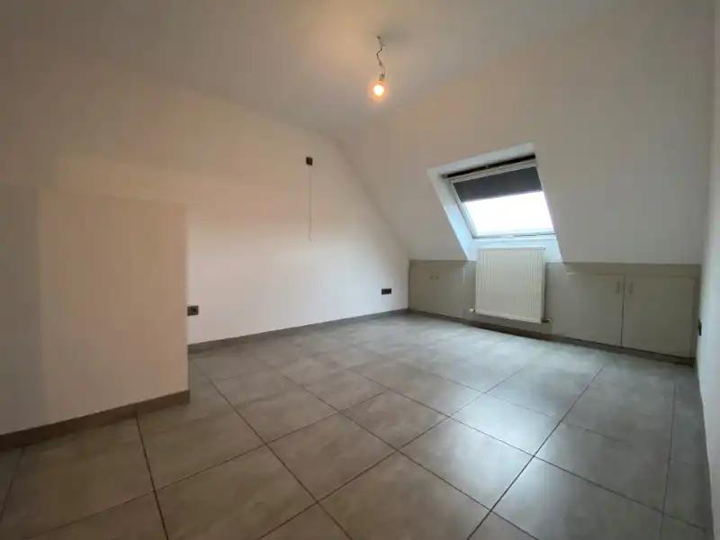 Duplex-appartement met 2 slpks en terras in het centrum van Houthalen foto 4