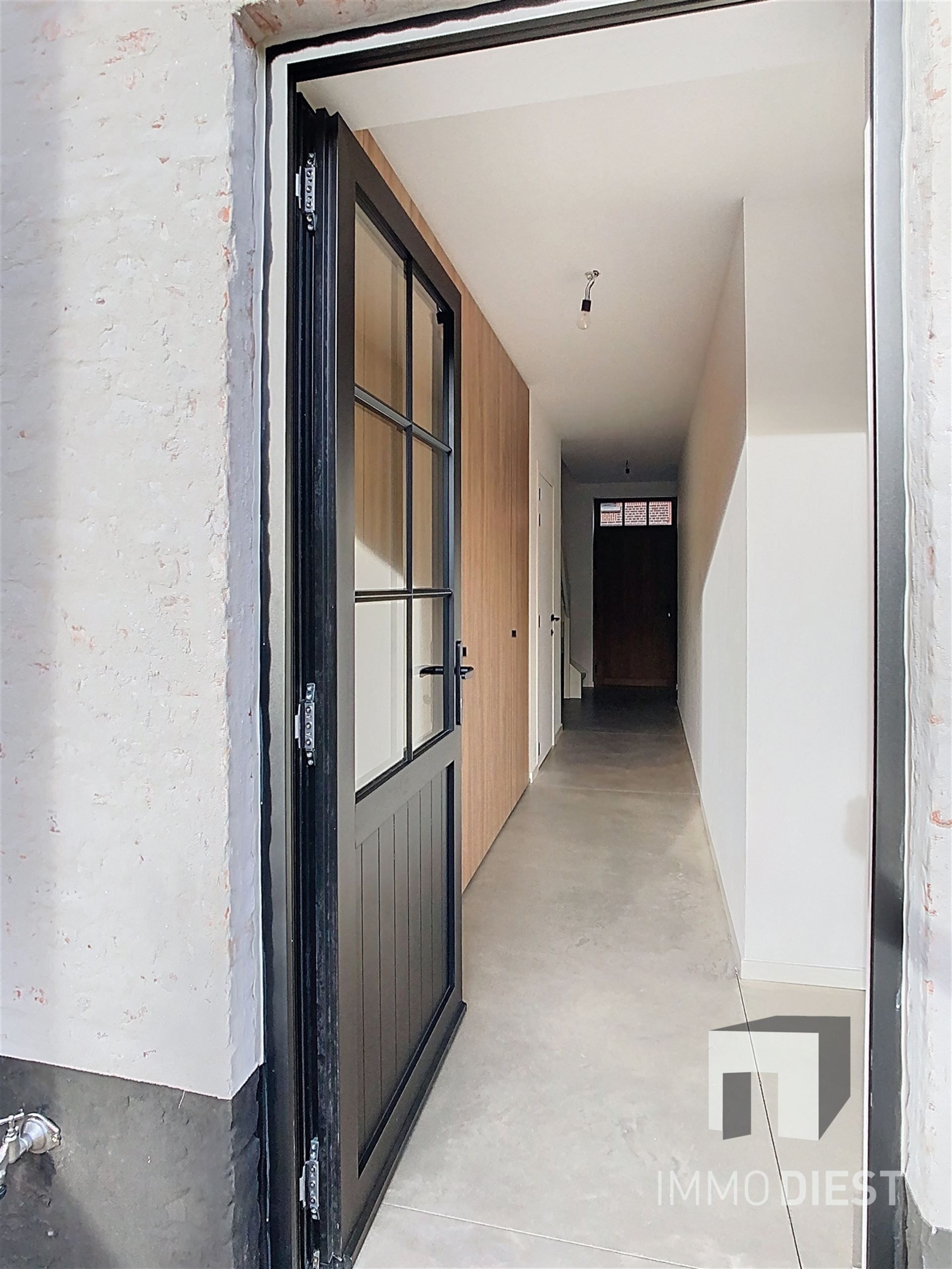 Charmante energiezuinige nieuwbouwwoning met zonnige tuin in hartje Zichem. foto 22