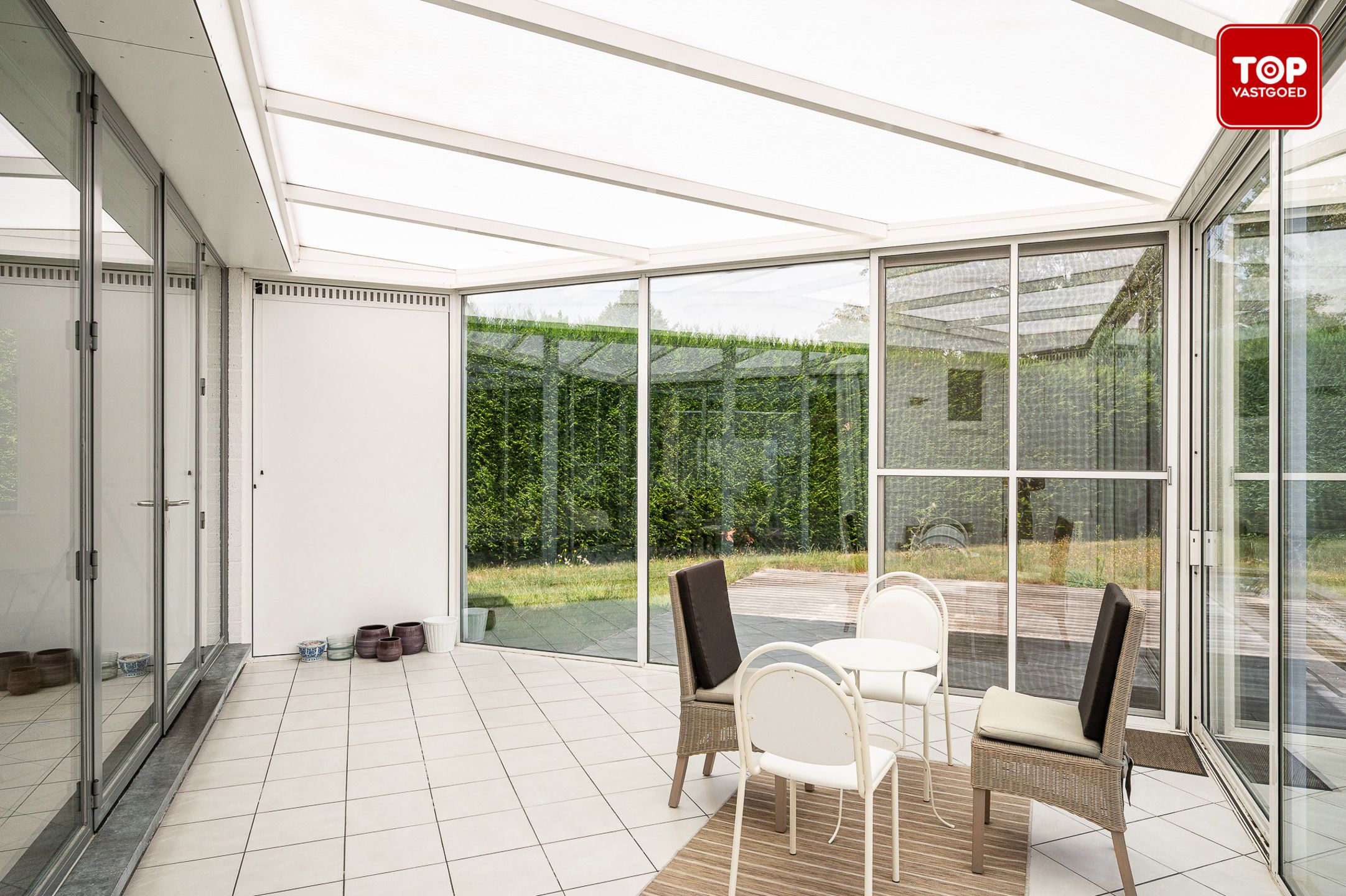 Open bebouwing een perceel van 690m² met mooie tuin en garage.  foto 14