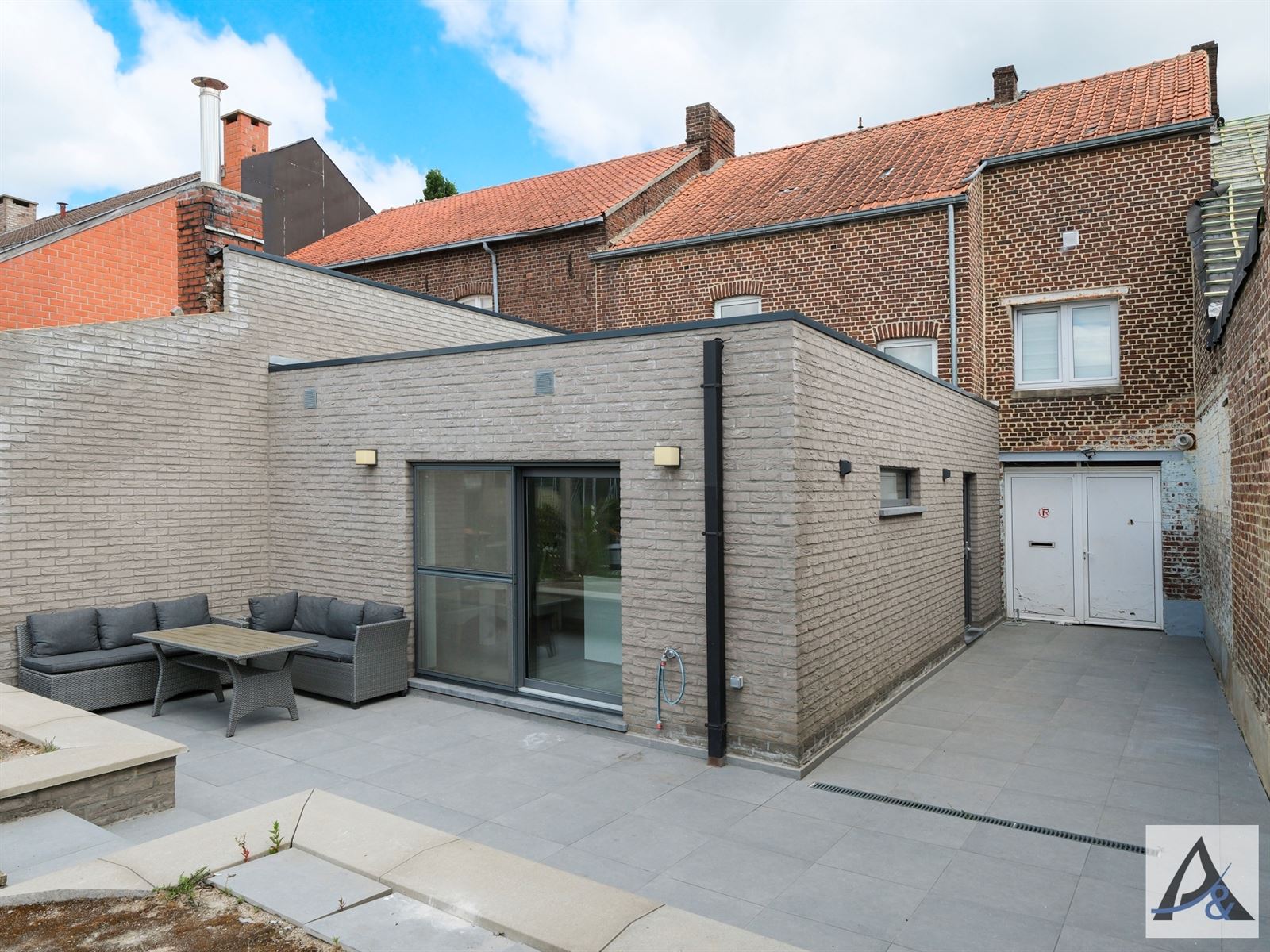Instapklare gezinswoning met tuin en garage in hartje Munsterbilzen foto 3