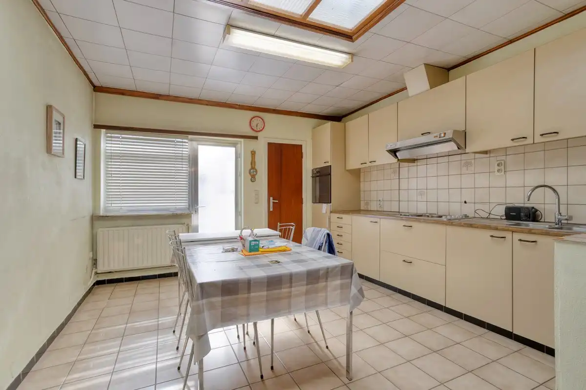 Gezellige woning met 3 slaapkamers, kelder, veranda en garage in Leuven! - EPC 598 kWh/m² - bewoonbare opp. 116 m² foto 6