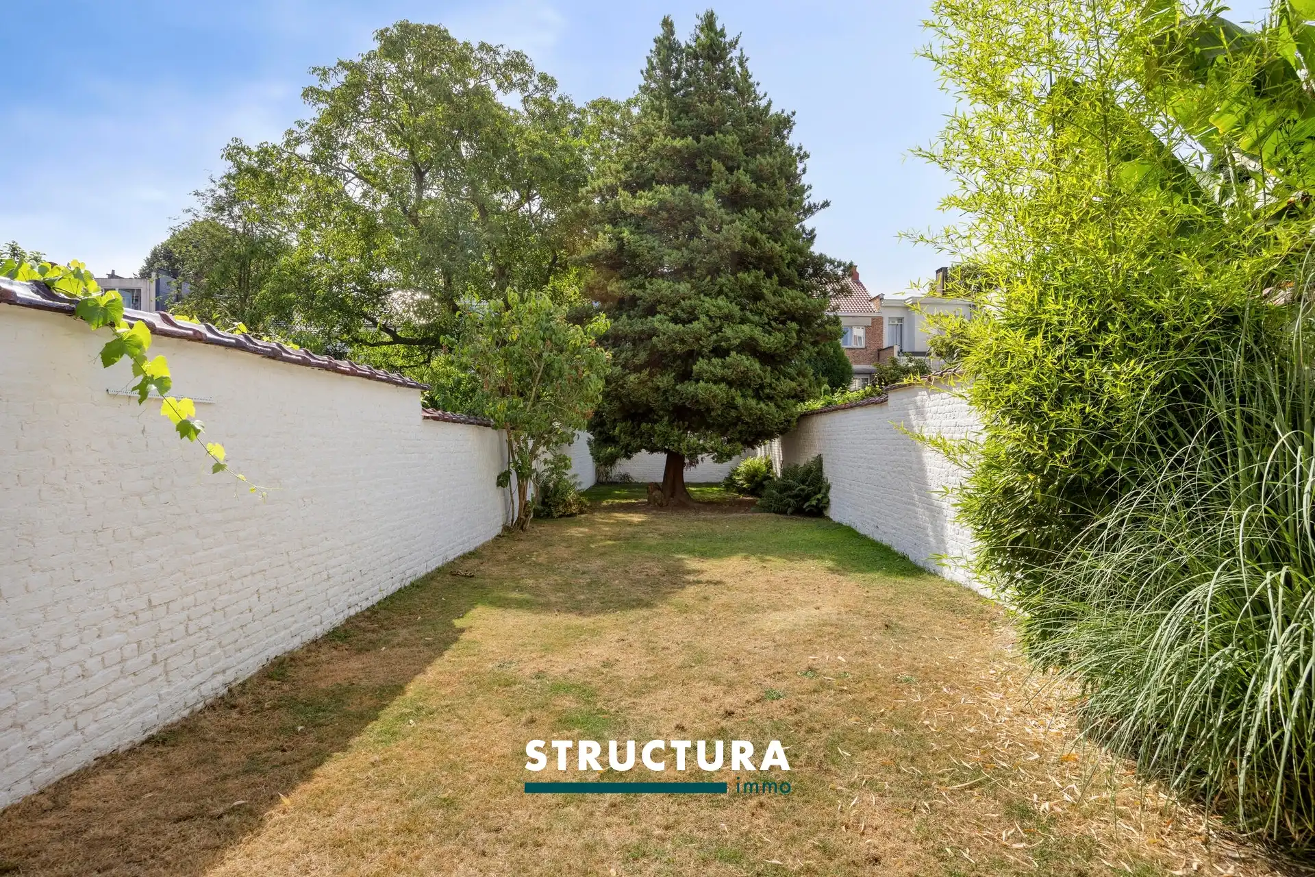 Ruime en lichtrijke woning met een aangename zuidgerichte tuin. foto 37