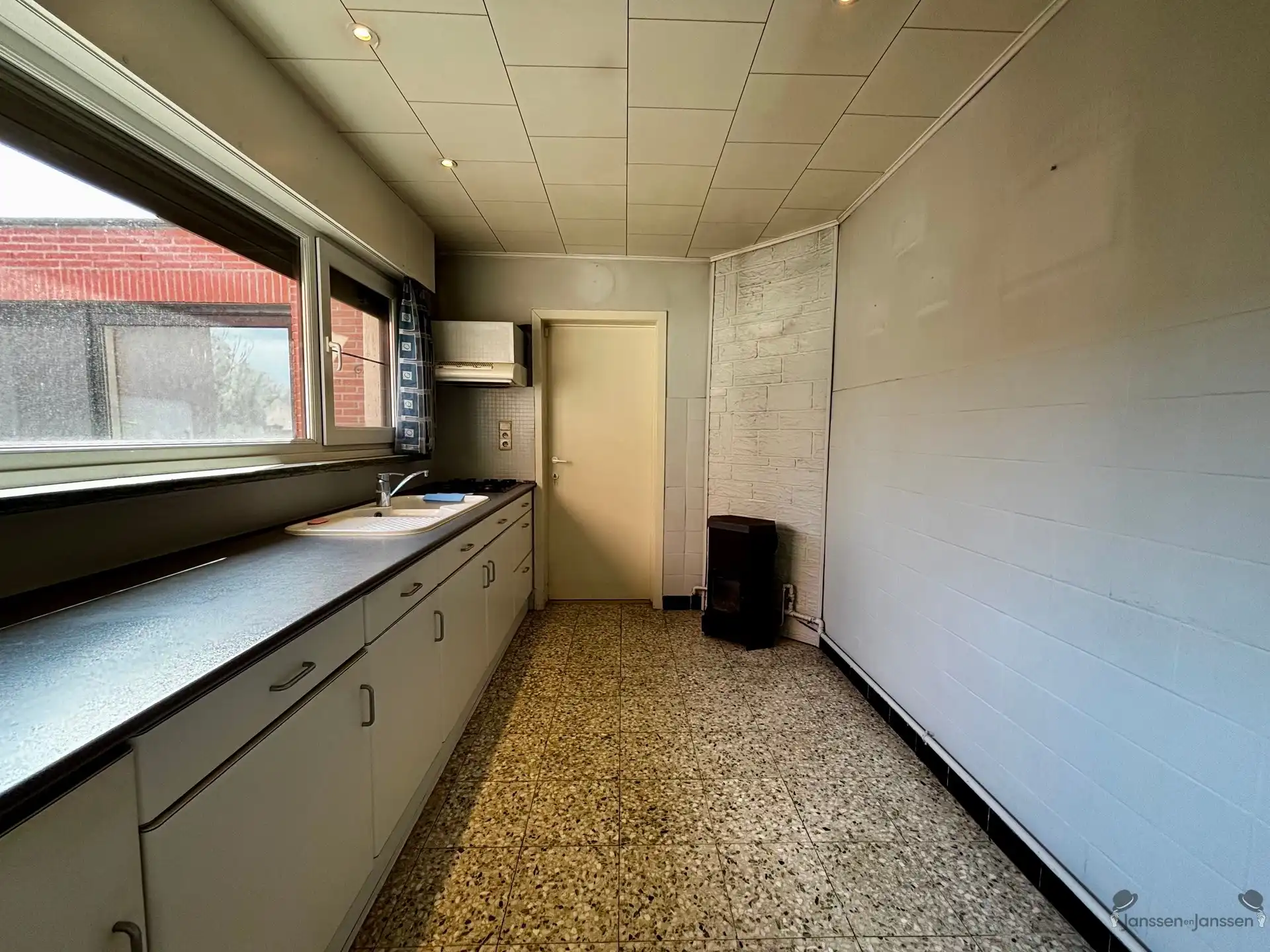 Halfopen bebouwing met 3 slpkmrs & garage foto 4