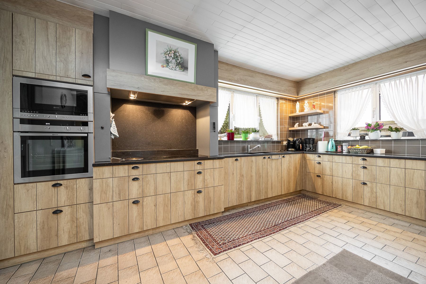 Het betreft een gerenoveerde laagbouwwoning in het centrum van Oud-Turnhout op een perceel van ca 600 m². foto 7