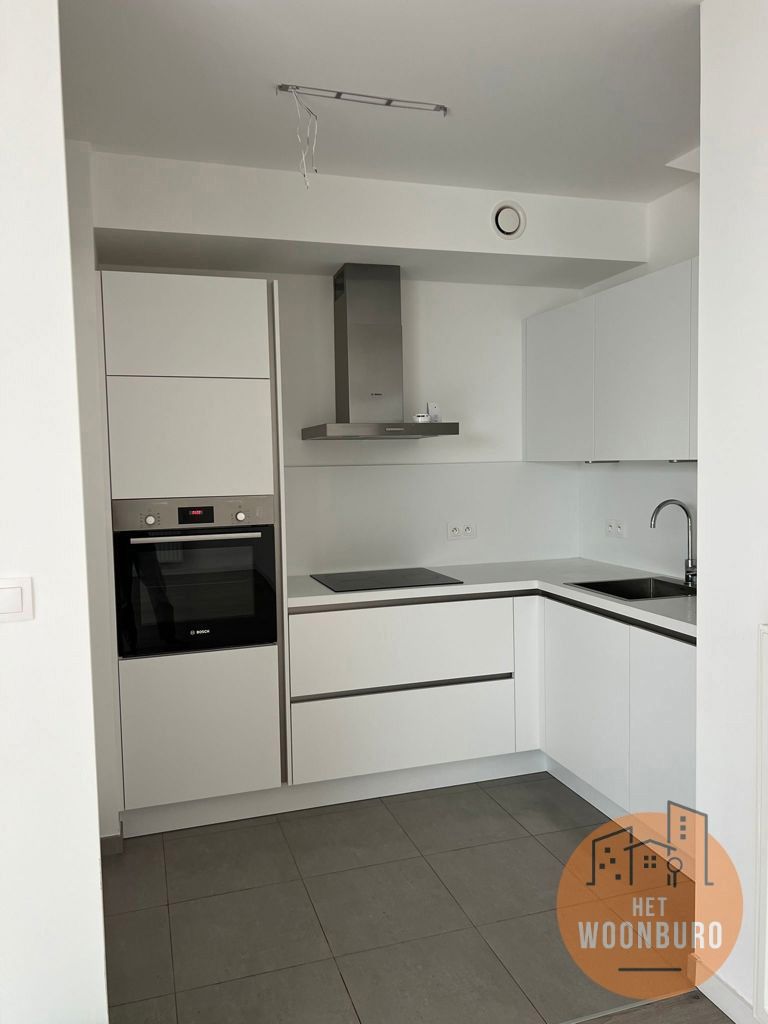 Gelijkvloersappartement met tuin, kelder en parkeerplaats foto 3