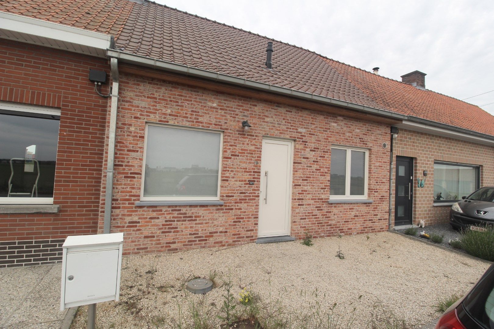 WONING MET TUIN EN TWEE SLAAPKAMERS IN LANGEMARK foto {{pictureIndex}}