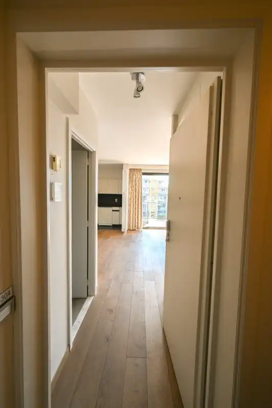 Ruim 1 slaapkamer appartement met zijdelings zeezicht en aankoopmogelijkheid tot een dubbele garage! foto 23