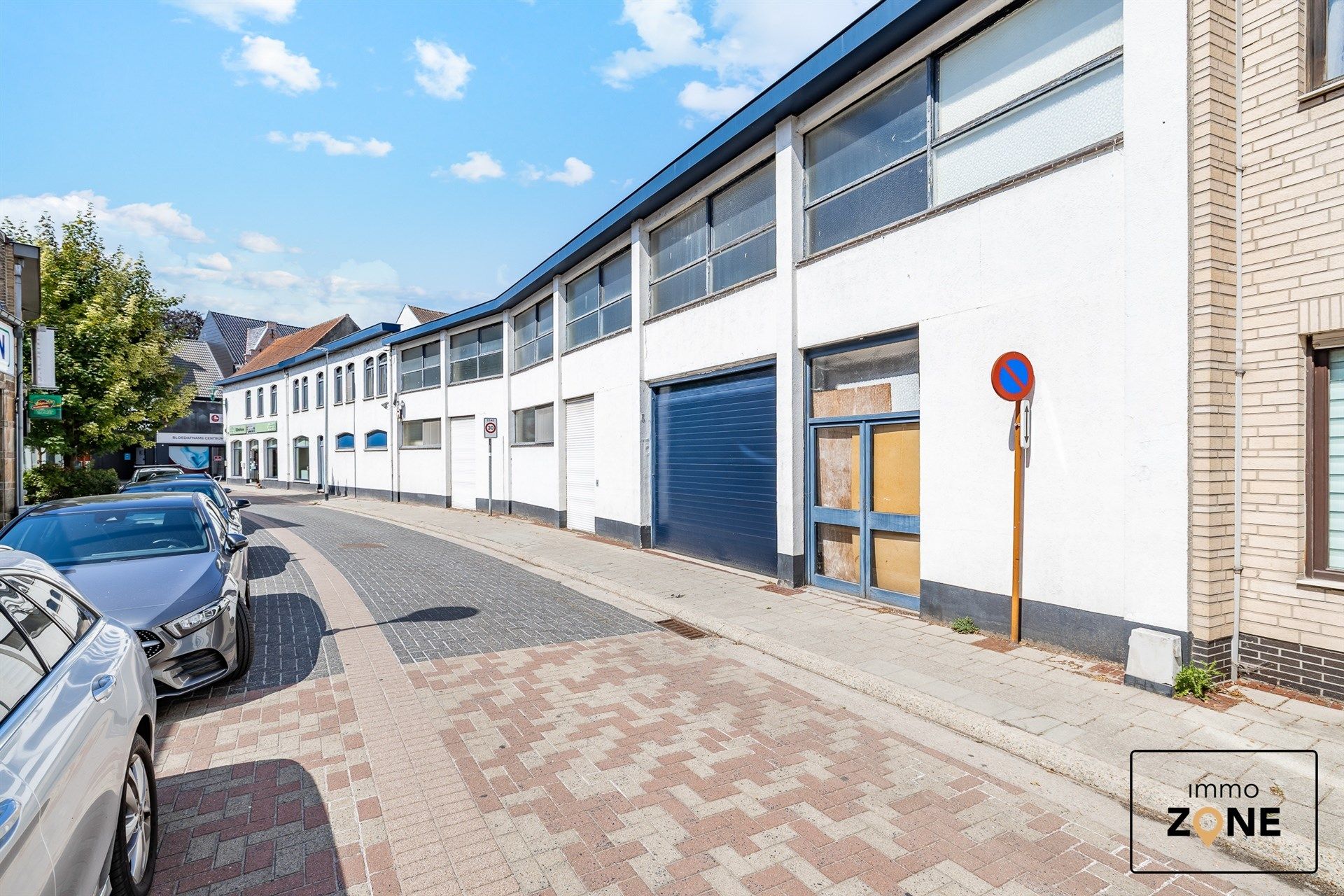 Handelspand met appartement te koop in het centrum van Hamme foto 2