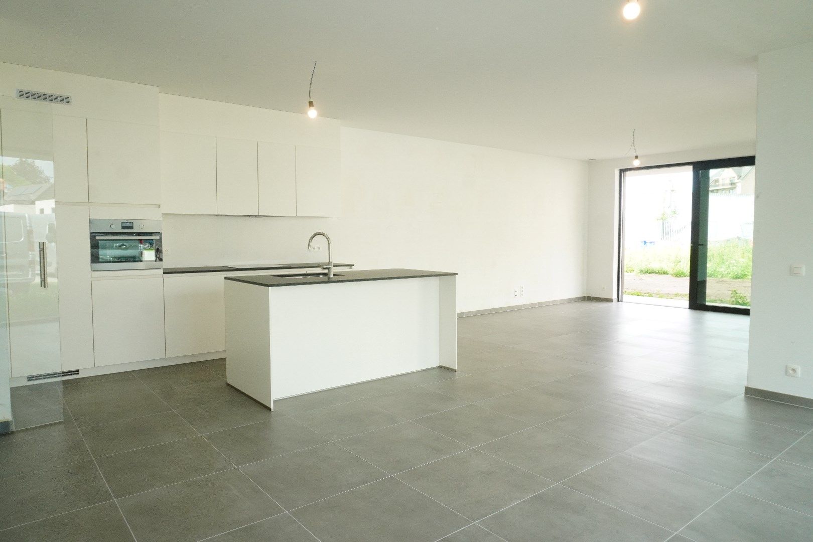 Luxe nieuwbouwappartement met tuin, 3 slaapkamers en autostaanplaats foto 4