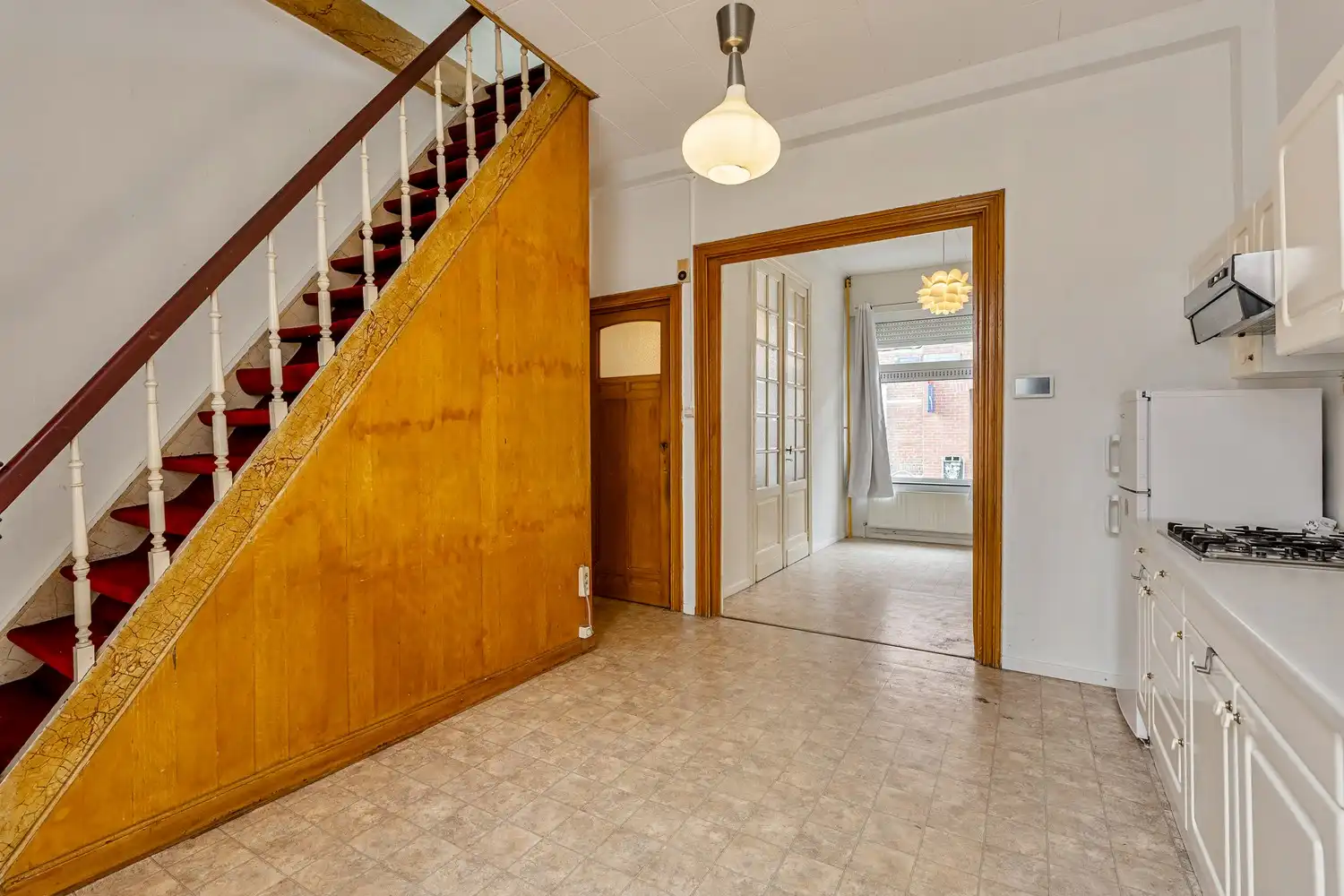 Goed gelegen rijwoning met 2 slaapkamers en een af te werken zolderruimte te Leuven! foto 11