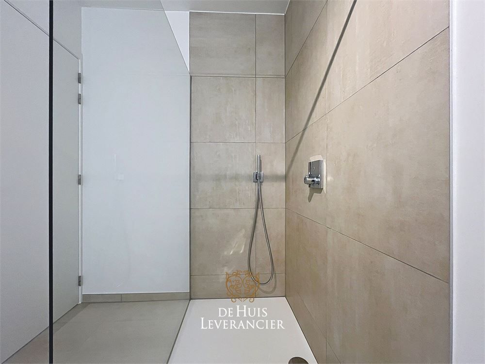 Discrete luxe & tijdloze elegantie : subliem nieuwbouwappartement met terras en gemeenschappelijk tuin te koop in Boechout foto 13