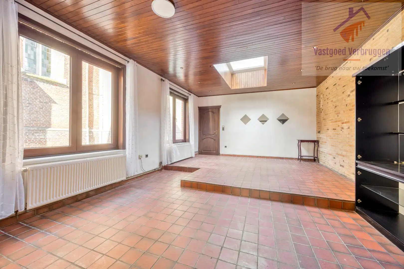 Ruime woning vergund als kamerwoning (3 kamers) met winkelruimte foto 7