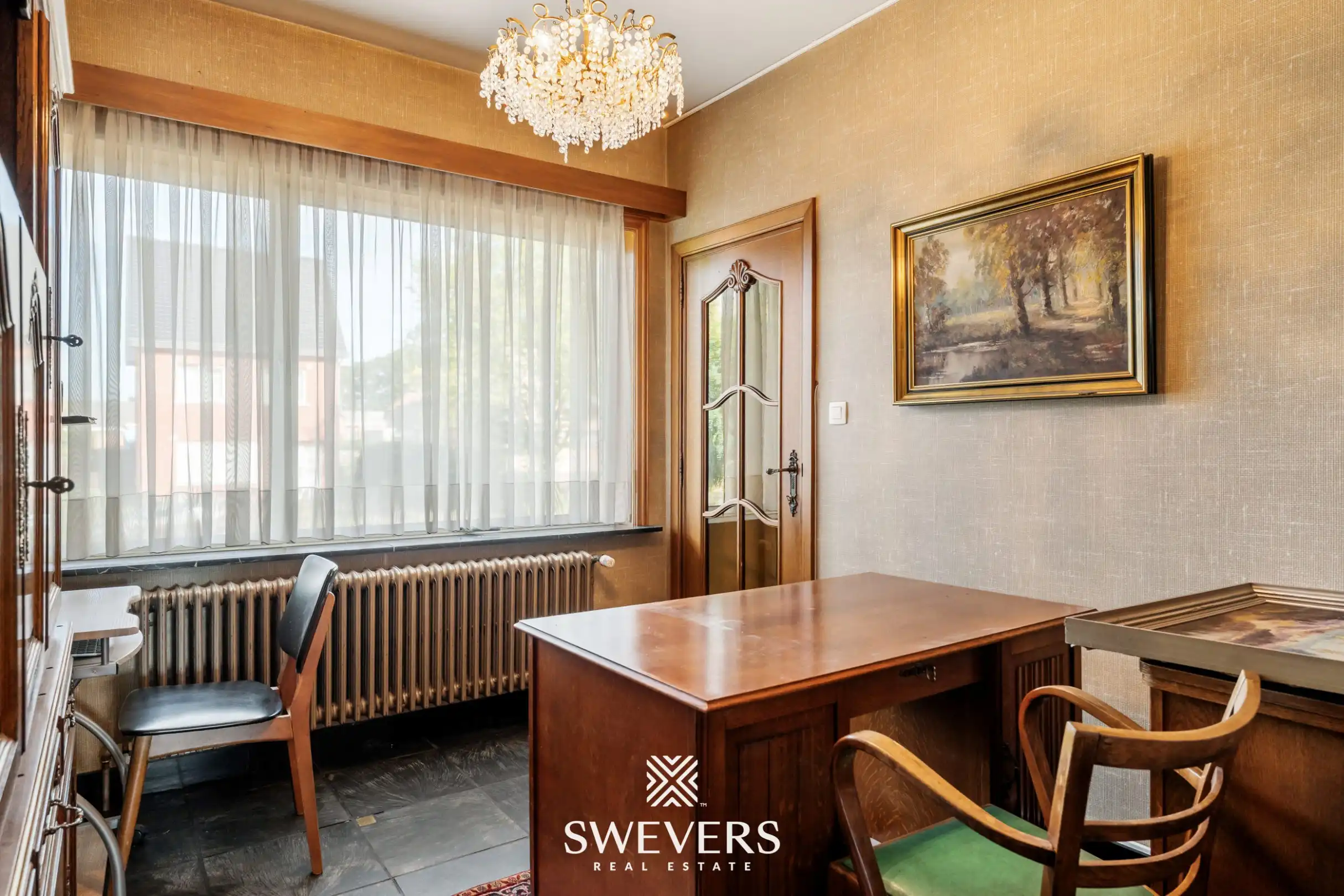 Knappe woning met orangerie, mogelijkheid tot 4 slpk en achterliggende bouwgrond foto 16