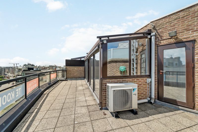 Schitterend gelegen 1 slpk penthouse met royaal dakterras foto 10
