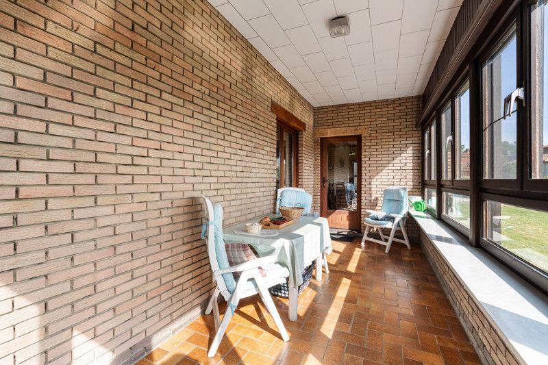 Gelijkvloerse woning met grote loods achteraan op 25are foto 17