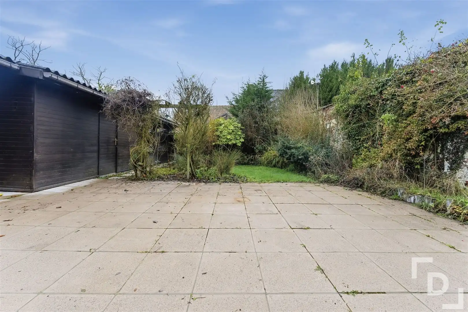 Te renoveren woning met inpandige garage in centrum Watou foto 5