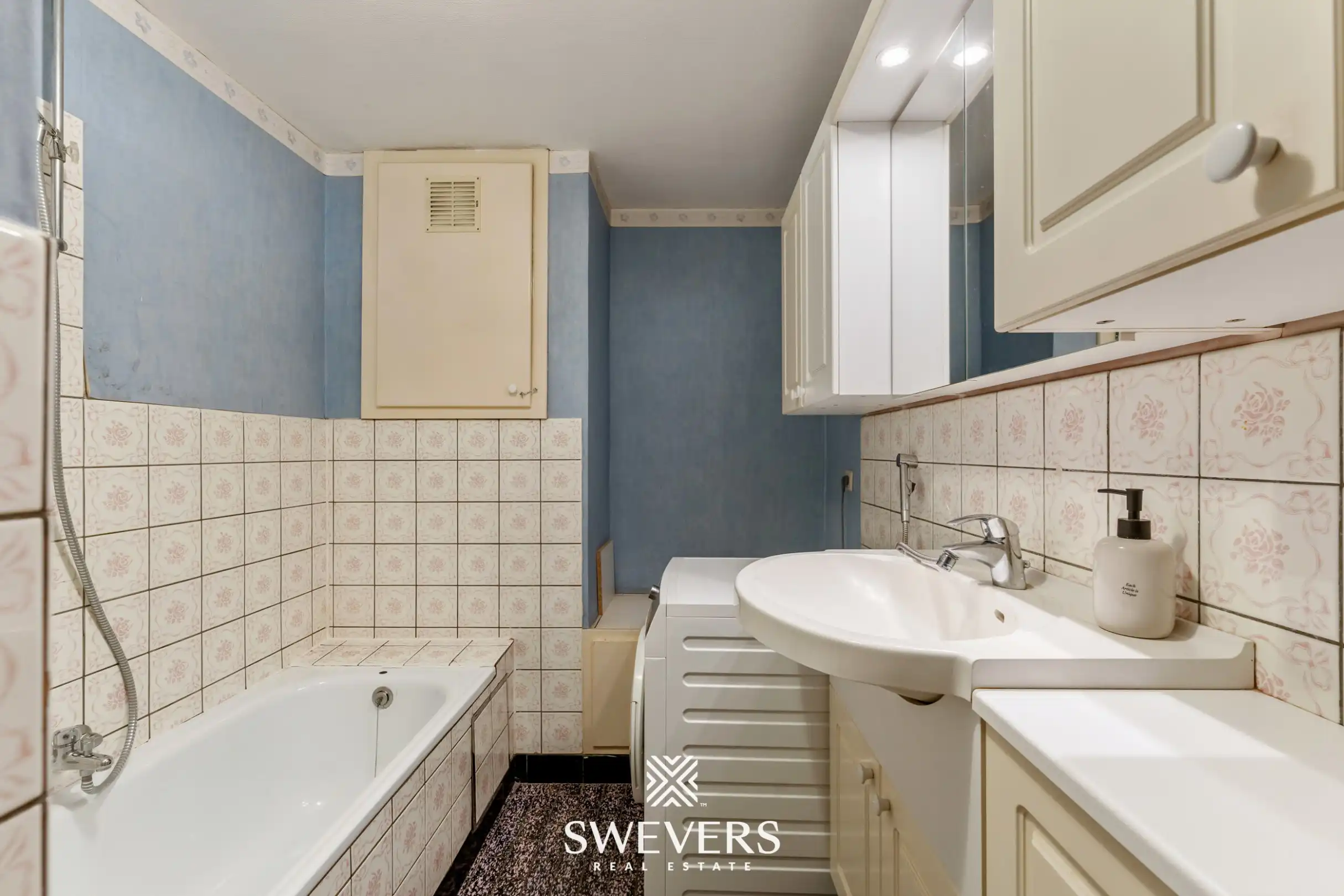 Ruim en lichtrijk 3-slpk appartement met 2 terrasjes in hartje Genk foto 12