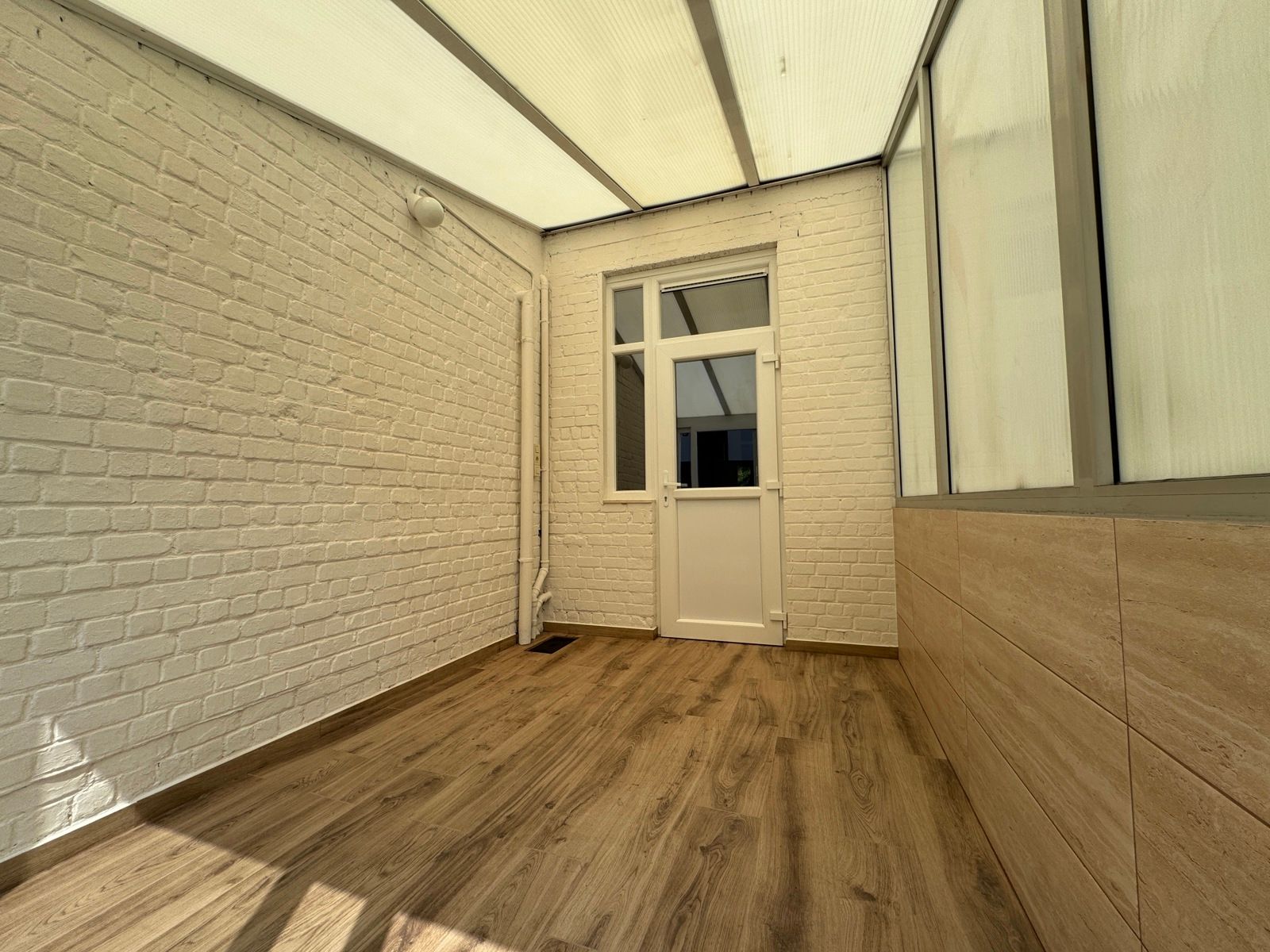 Rustig gelegen gelijkvloers-appartement met tuin foto 15