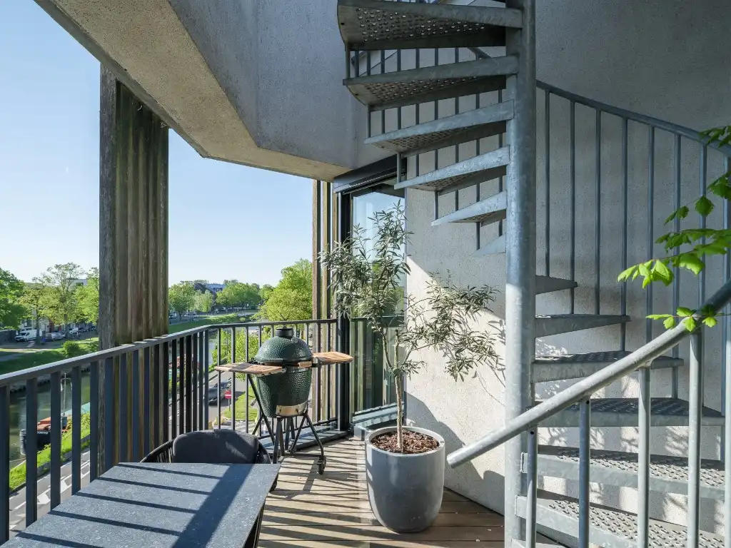 Stijlvol appartement met dakterras, waterzicht en EPC A-score nabij het centrum van Gent. foto 3