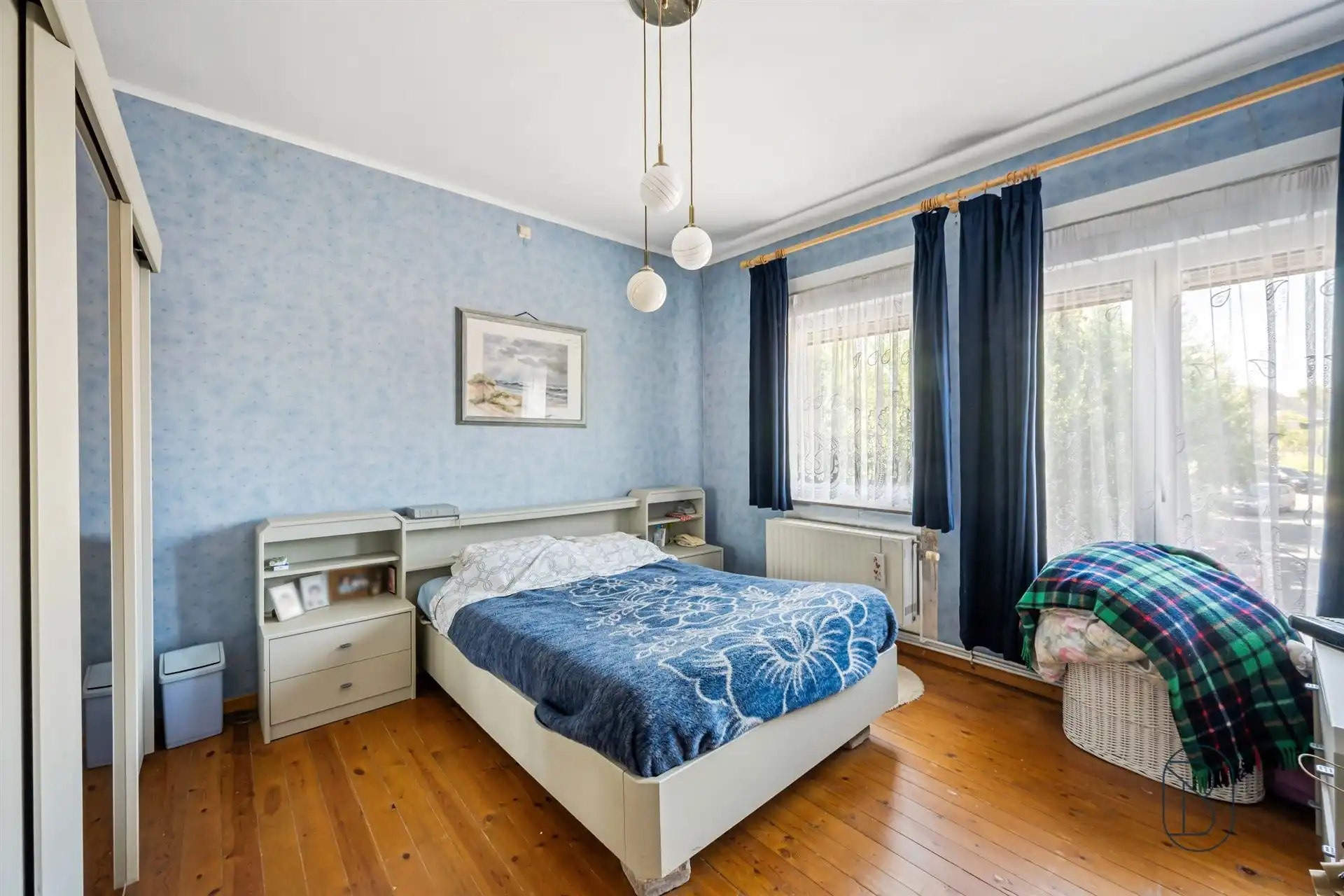 Instapklare 3-slpk woning met 2 garages, tuin en bouwgrond! foto 15