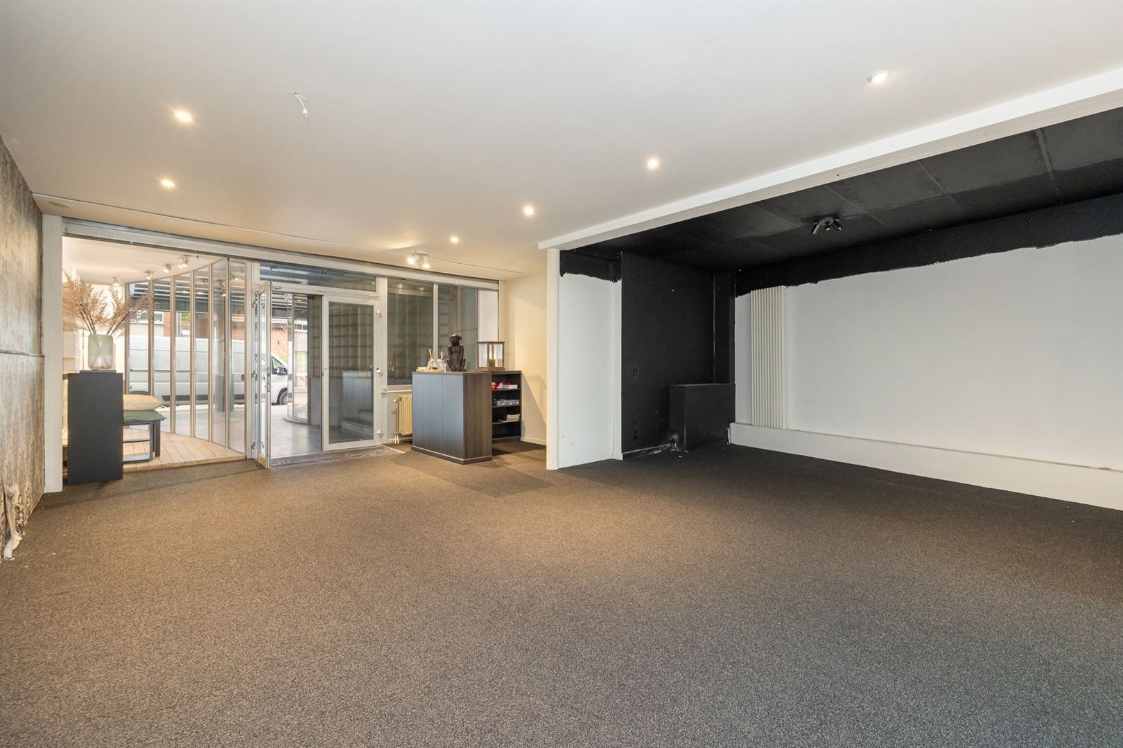 Handelshuis met ruime winkel en duplex appartement in dorp 's Gravenwezel foto 5