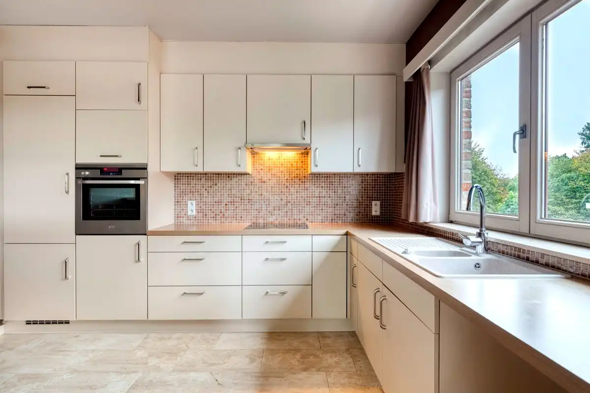 Residentieel gelegen villa-appartement midden in een parktuin te Gentbrugge foto 6