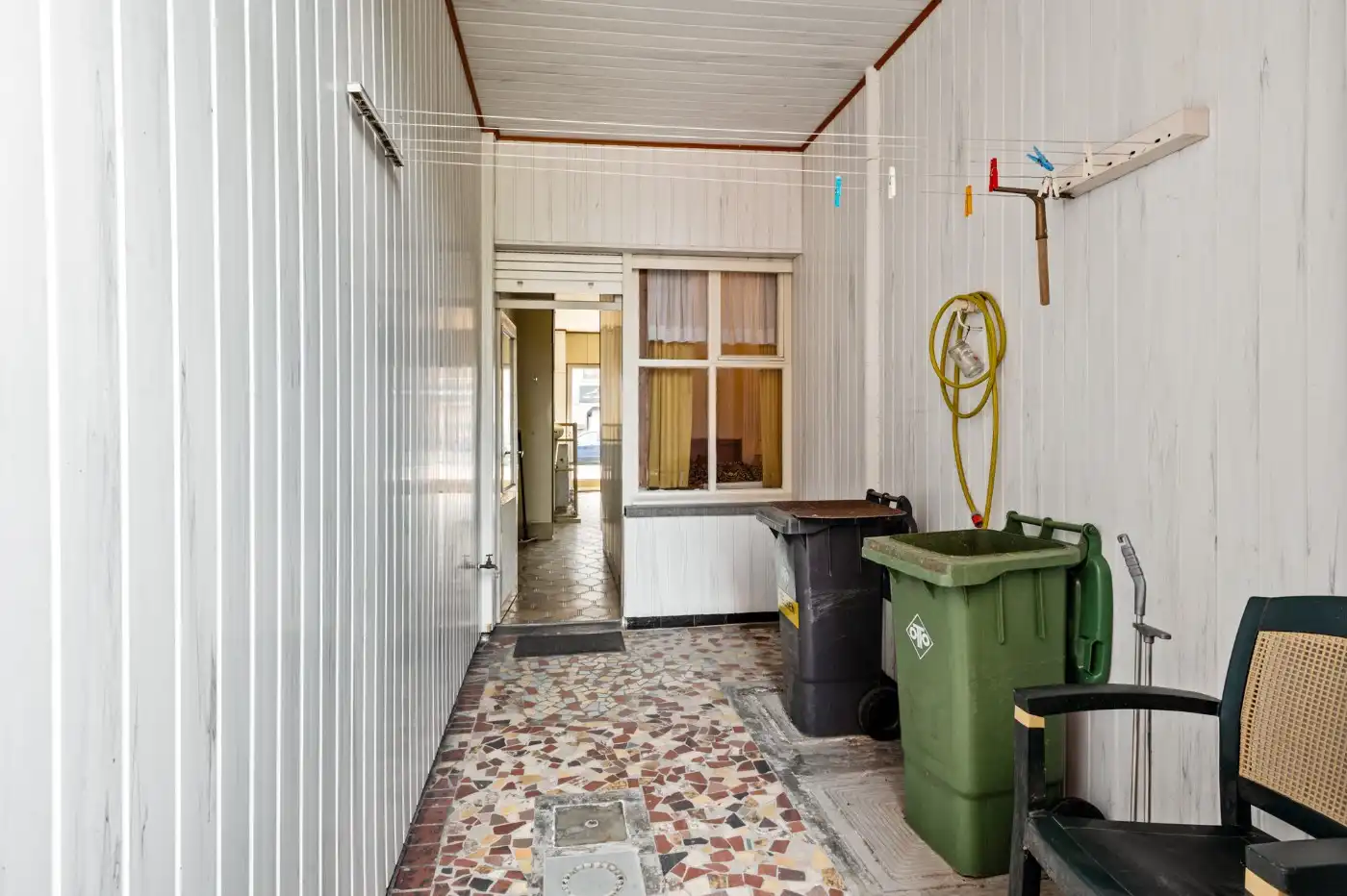 Te renoveren woning met 2 slpk., dubbele garage en tuin foto 21