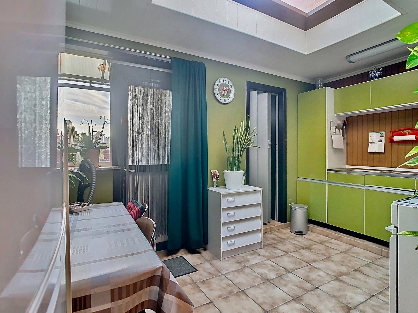 Centraal gelegen, Te renoveren Woning met 2 SLPK én Tuin! foto 7