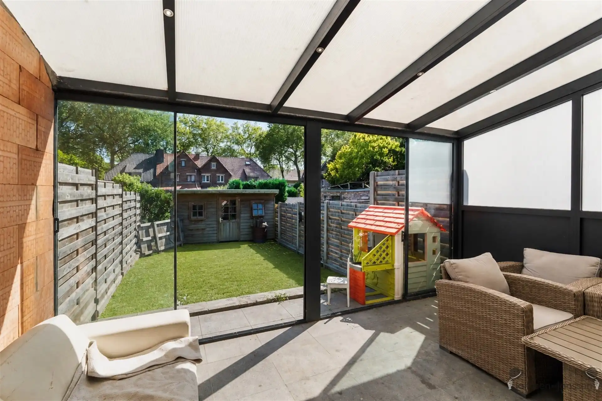Charmante rijwoning met tuin in het groene Waterschei foto 18