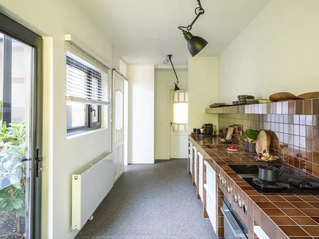 Klassevolle herenwoning met interieur van Peter Ivens & Bea Mombaers, volwassen stadstuin, inpandige garage en uitzonderlijk zicht op de Visserij. foto 19