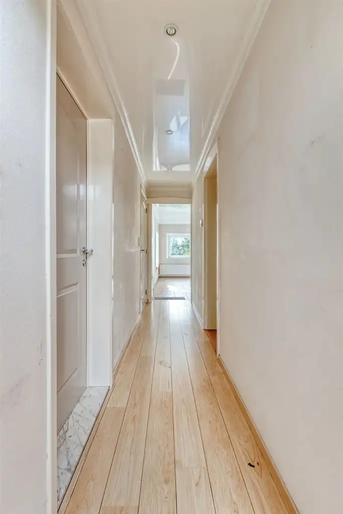 Charmante halfopen bebouwing met 3 slaapkamers, omheinde tuin en zonnepanelen, gunstig gelegen nabij het centrum van Maaseik. foto 11