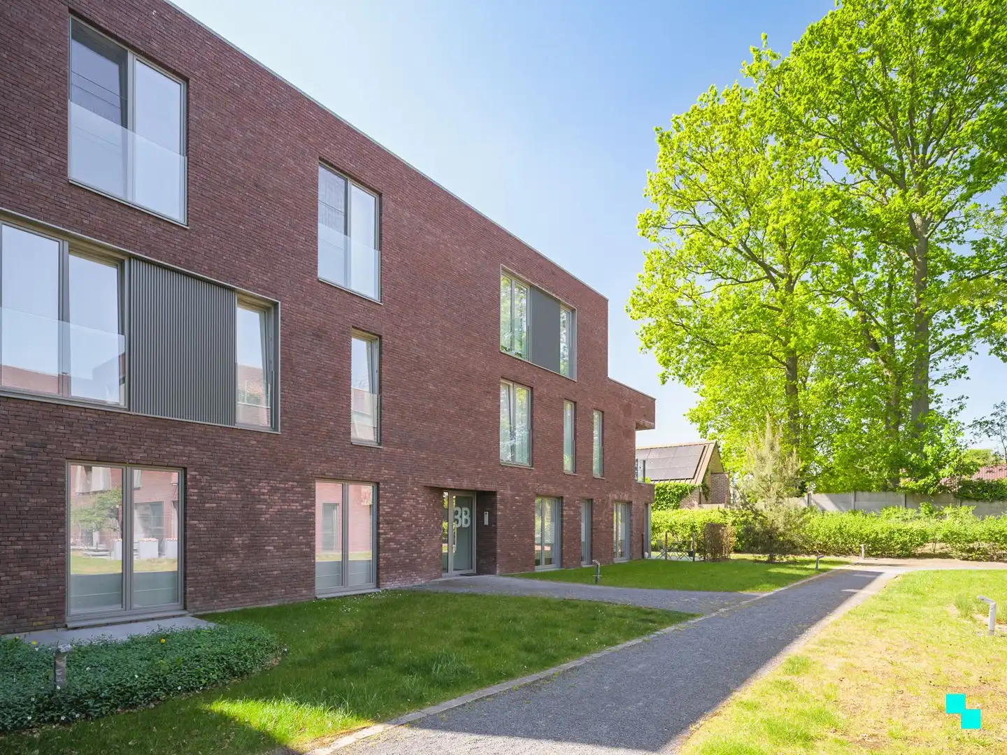 Gelijkvloers appartement omgeven door groen aan de Sint-Denijskerk foto 22