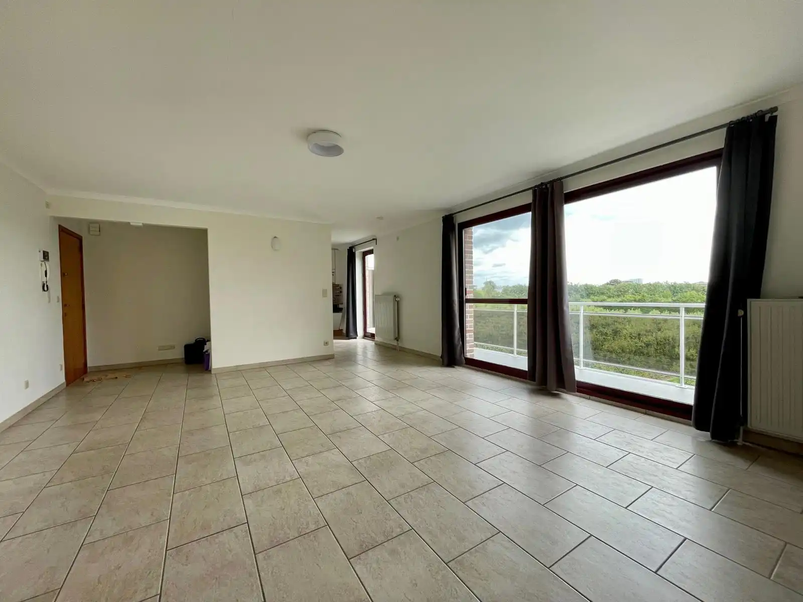 Mooi appartement nabij centrum Tienen met 2 slpks en garage. foto 2