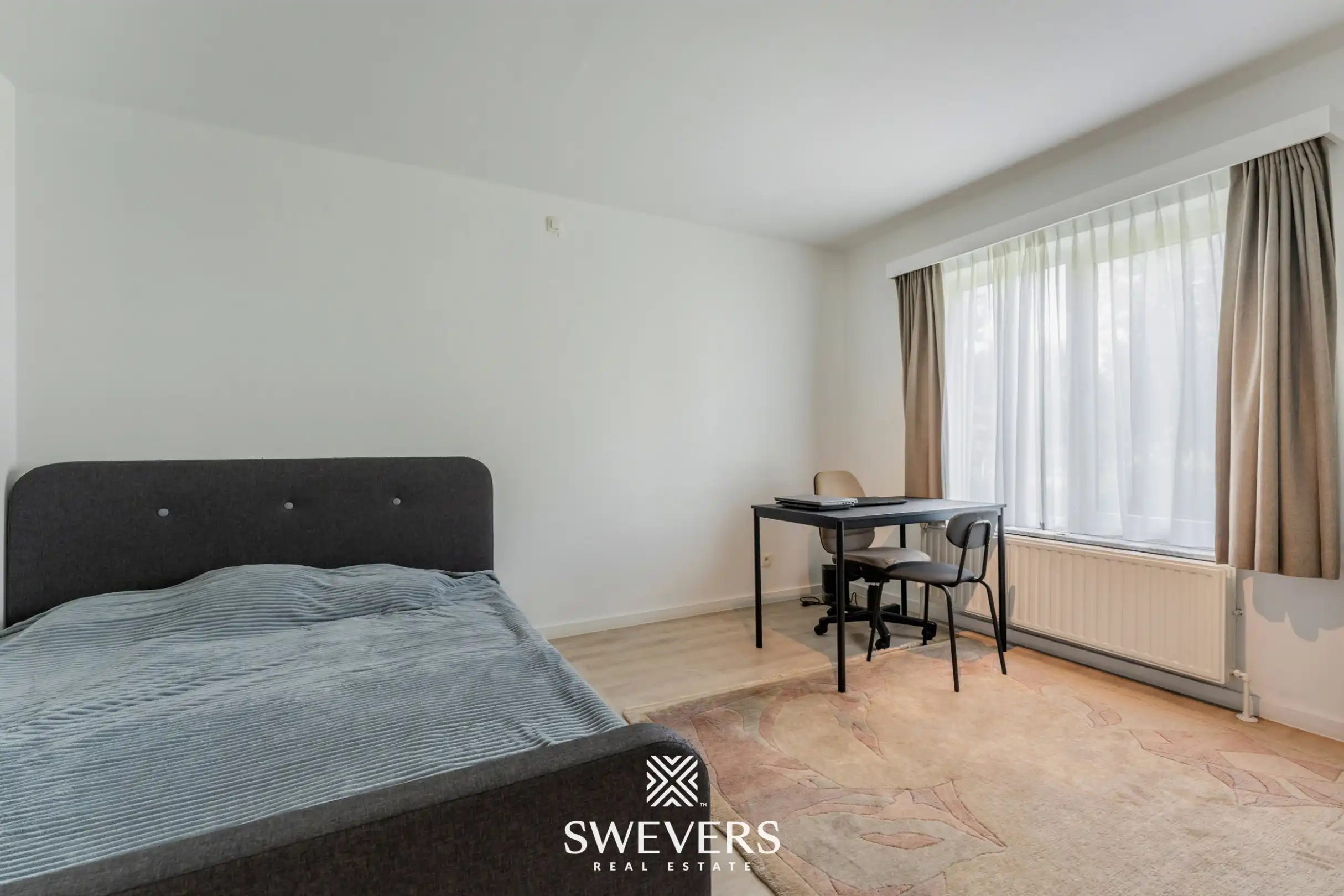 Instapklaar gelijkvloers 3-slaapkamerappartement met autostaanplaats en kelderberging nabij Hasselt-centrum foto 12