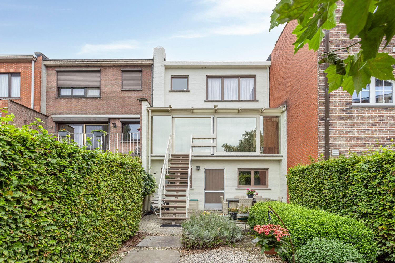 Mooie bel-étagewoning met 3 slks, garage, zomerkeuken en tuin! foto 40