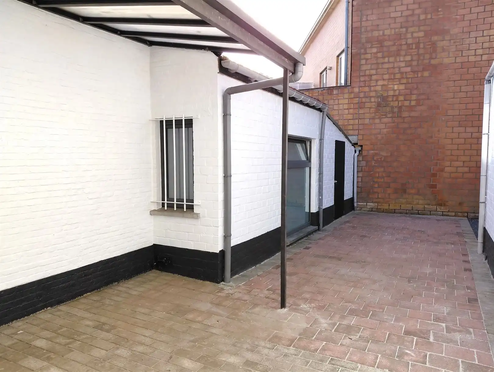 TE HUUR: Gesloten bebouwing met 2 slaapkamers in het centrum van Heusden! foto 20