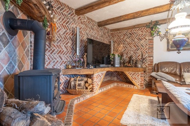 Charmante fermette woning met 4 slaapkamers, bureau en ruime werkplaats op een prachtig perceel in Arendonk! foto 11