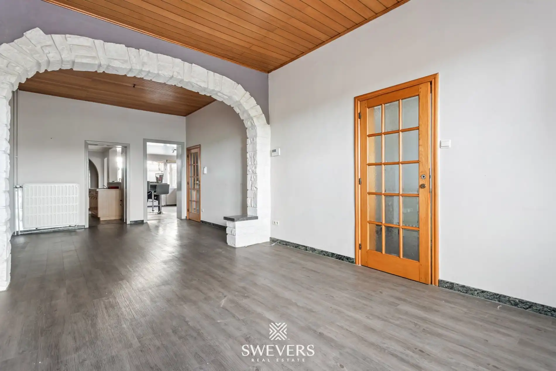 Ideale gezinswoning, instapklaar met ruime tuin en bouwgrond foto 3