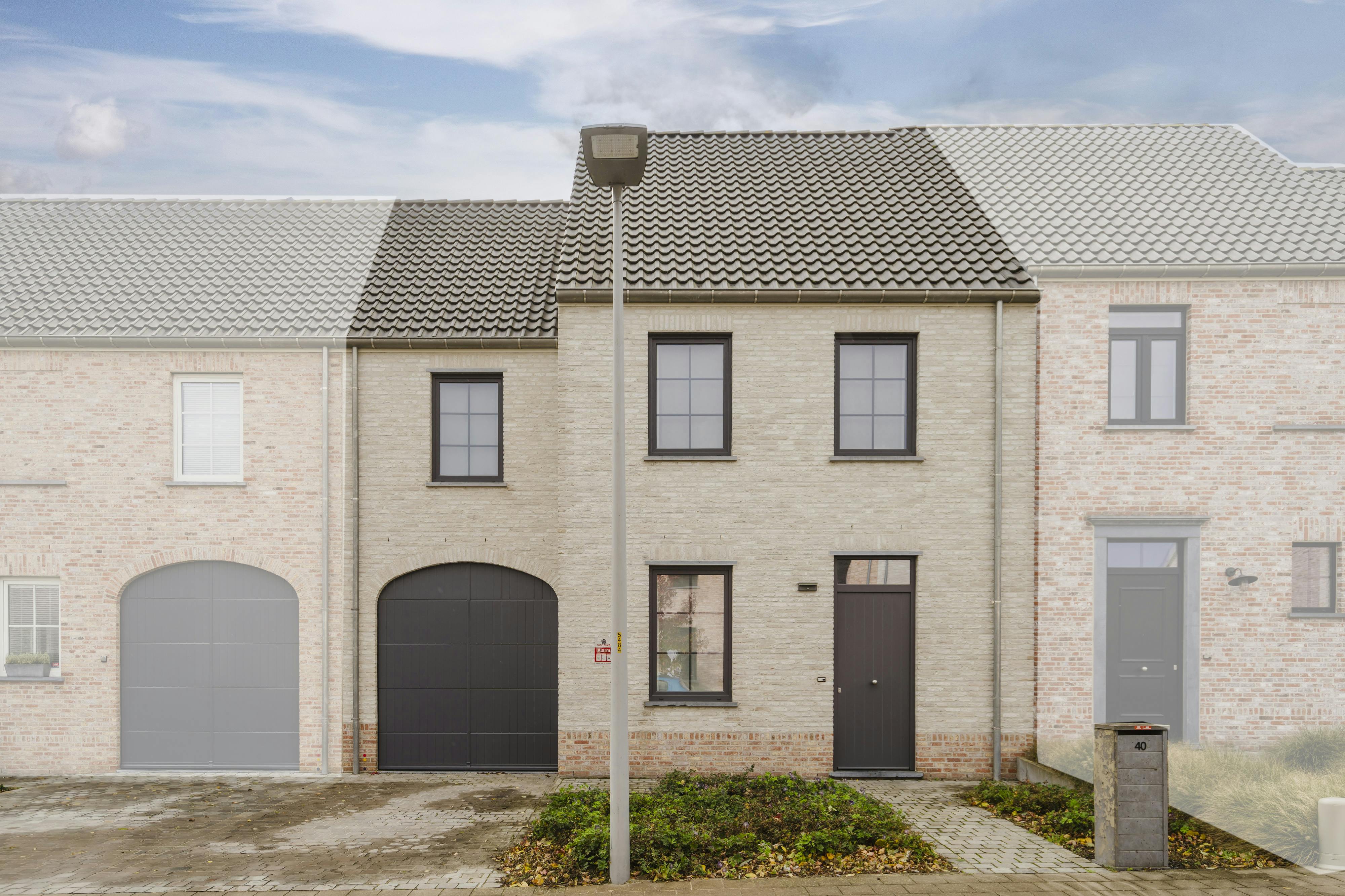 Nieuwbouwwoning met 3 slaapkamers te koop in Kortrijk foto {{pictureIndex}}