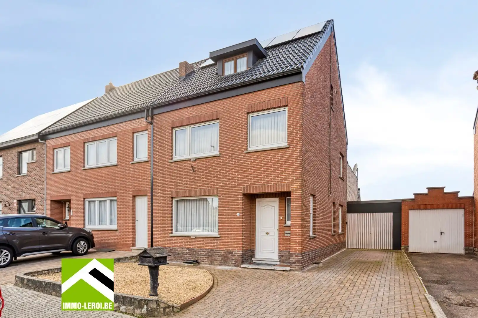 Hoofdfoto van de publicatie: Woning met diepe tuin, garage en vernieuwd geïsoleerd dak, centrum Borgloon