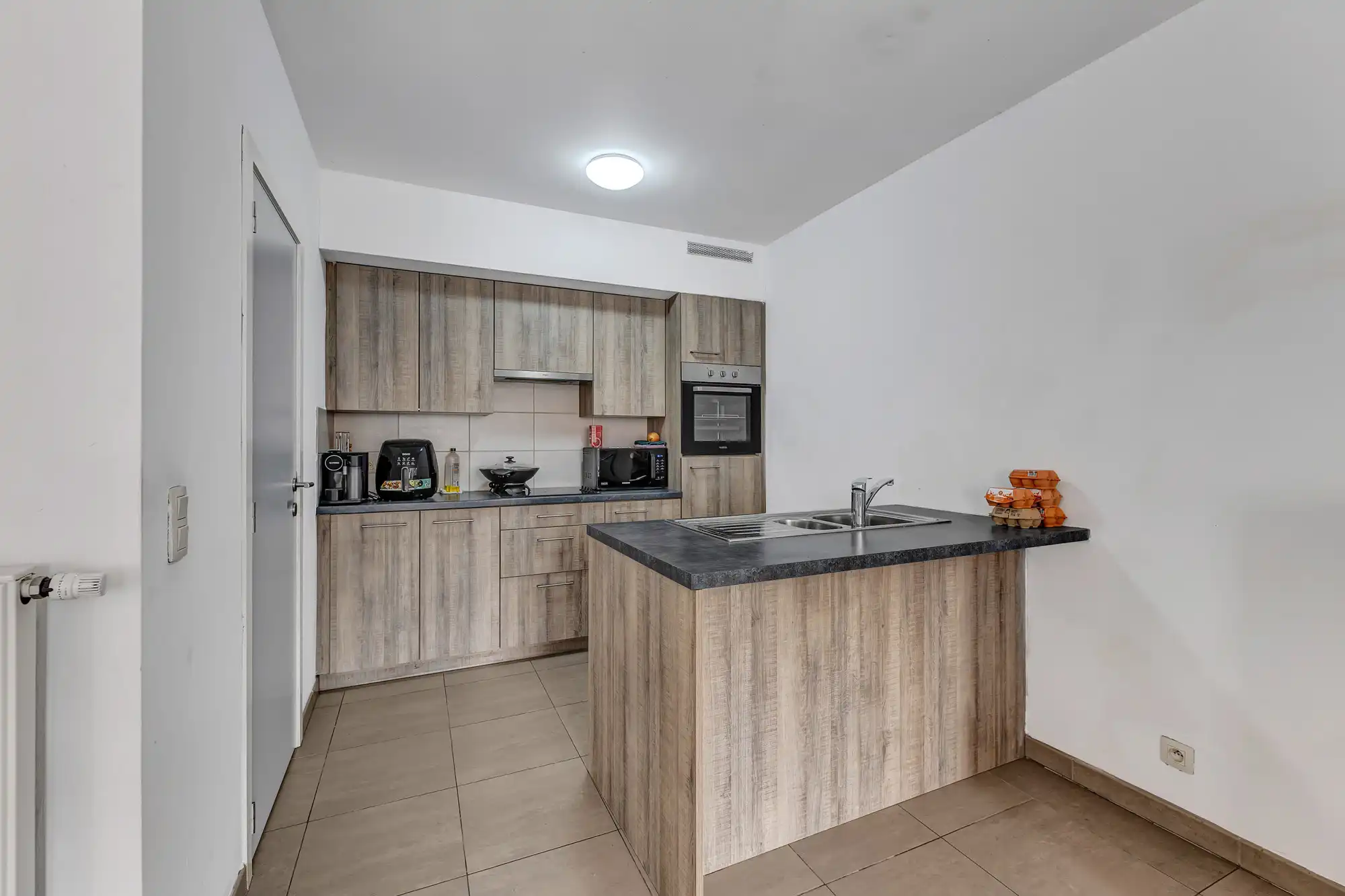 2-slaapkamer app met staanplaats in hartje Ninove foto 7