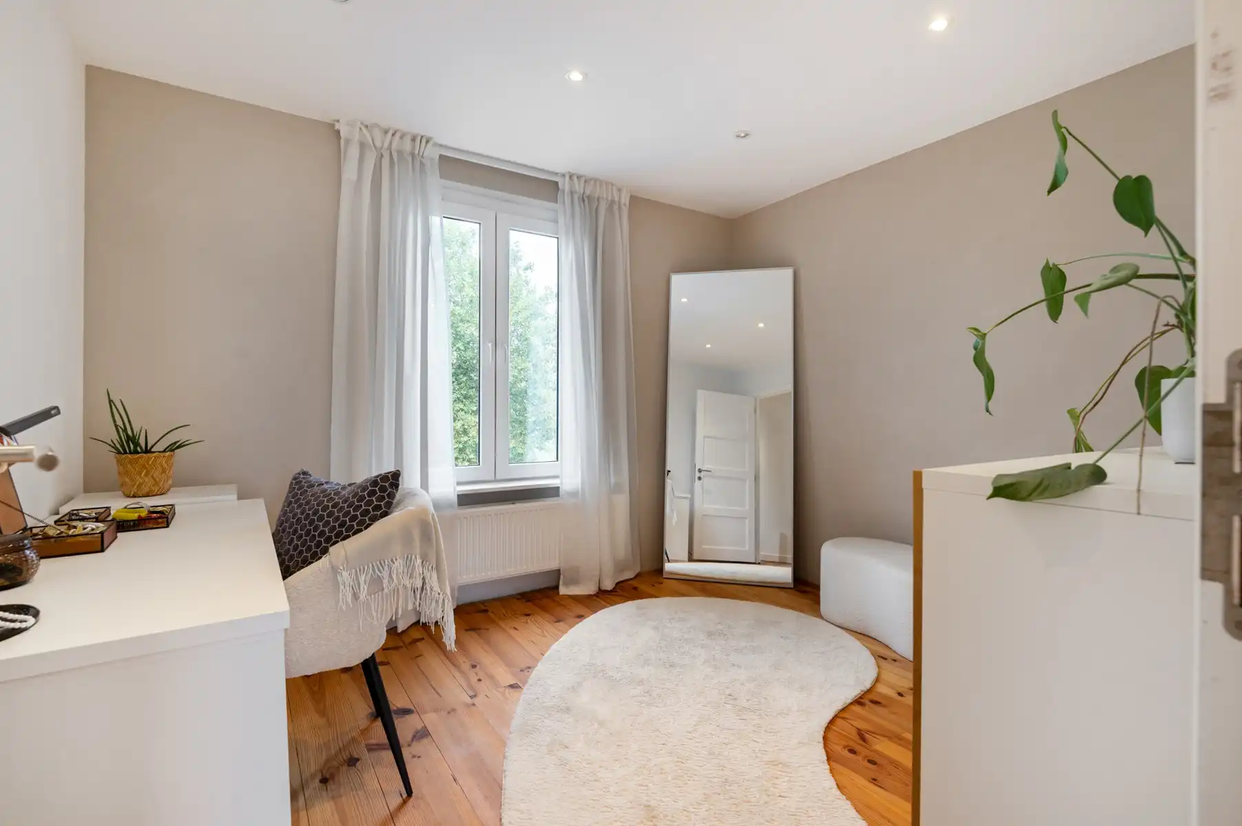 Ruime woning met 4 slaapkamers en gezellige stadstuin foto 12