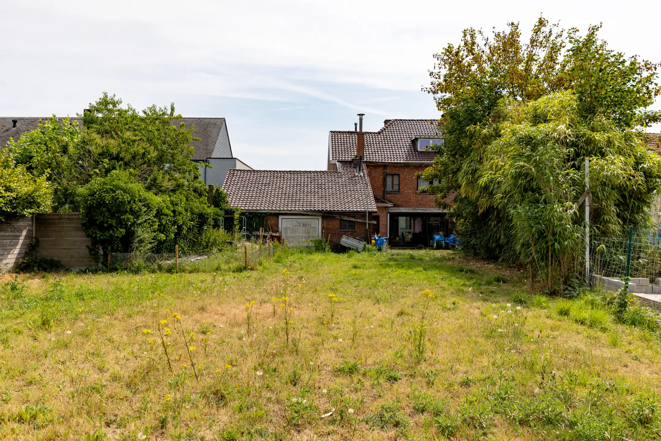 Te renoveren gesloten bebouwing met garage, ruime tuin en groenzicht in Oppuurs foto 21