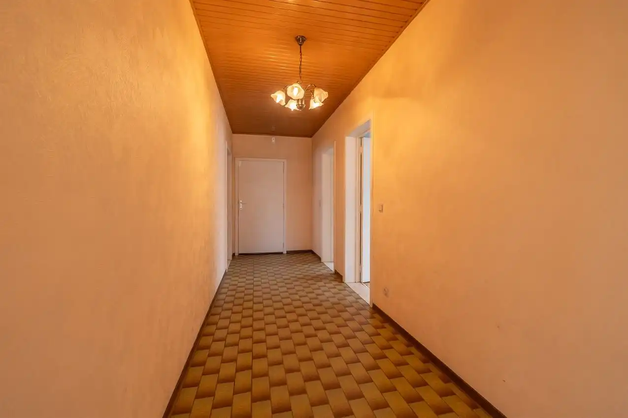 Gelijkvloerse woonst, 3 slpk, op 29a 53ca foto 8
