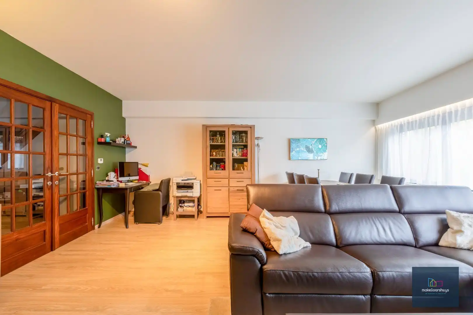 Heel ruime Instapklare woning in rij  met zonneterras en 2 staanplaatsen foto 8