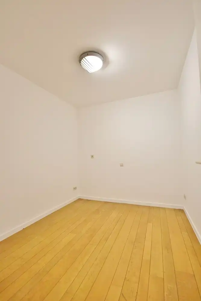 Gunstig gelegen gelijkvloers duplex appartement nabij de Grote Markt foto 12